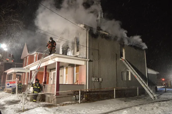 East Side house fire investigated as possible arson after empty gasoline cans found near origin point