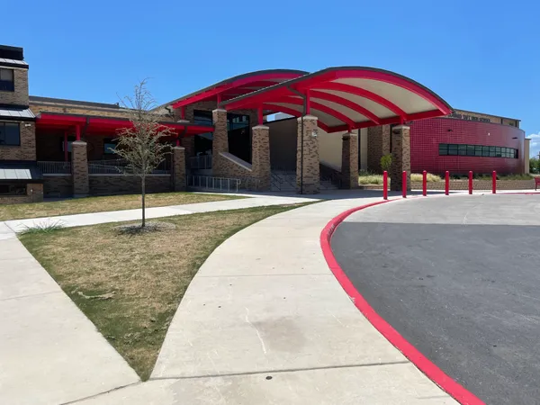 Taft High School students walk out to protest ICE presence, marching briefly along Culebra Road